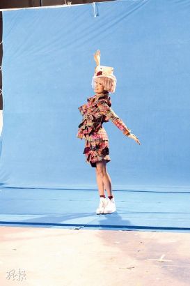 容祖儿拍电器广告变三项铁人(图)