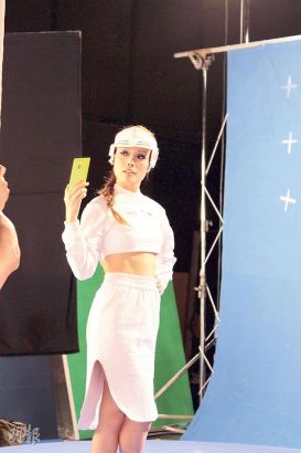 容祖儿拍电器广告变三项铁人(图)